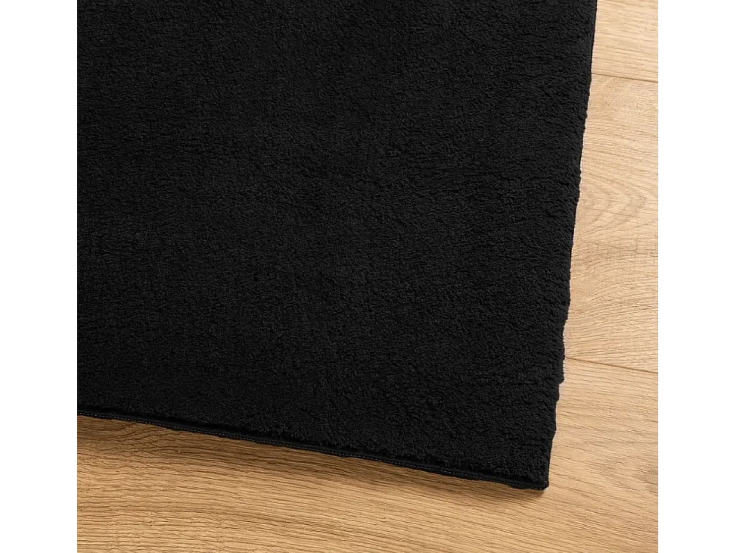 Alfombra HUARTE de pelo corto suave y lavable negra 80x250 cm