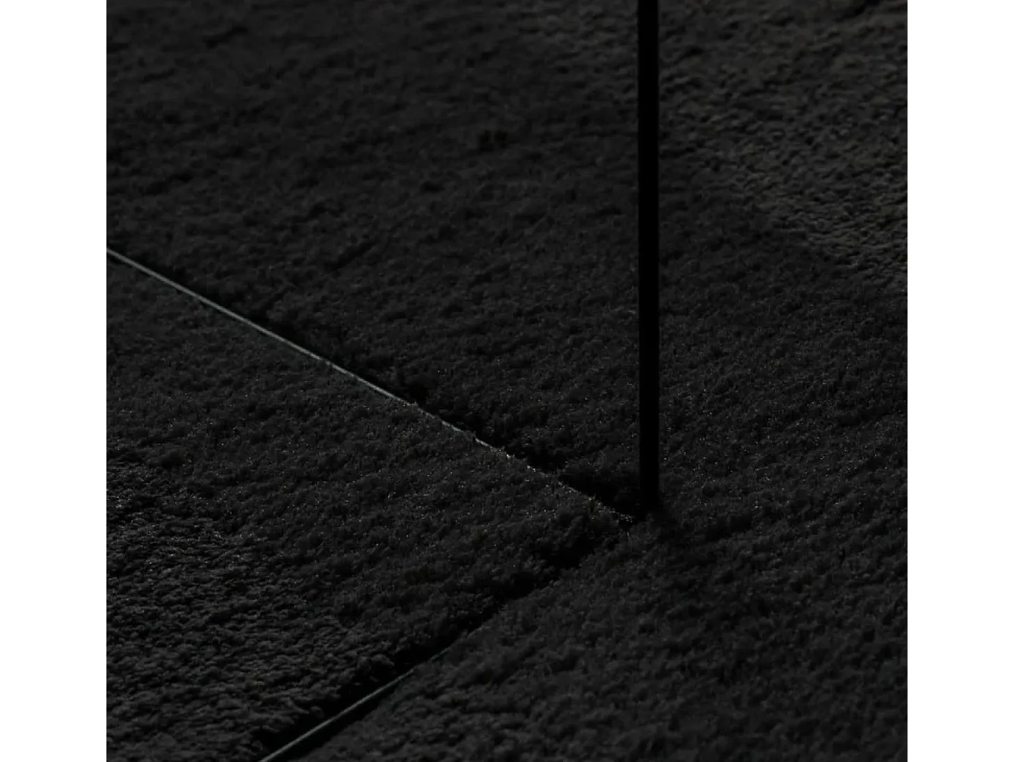 Alfombra HUARTE de pelo corto suave y lavable en color negro Ø 100 cm