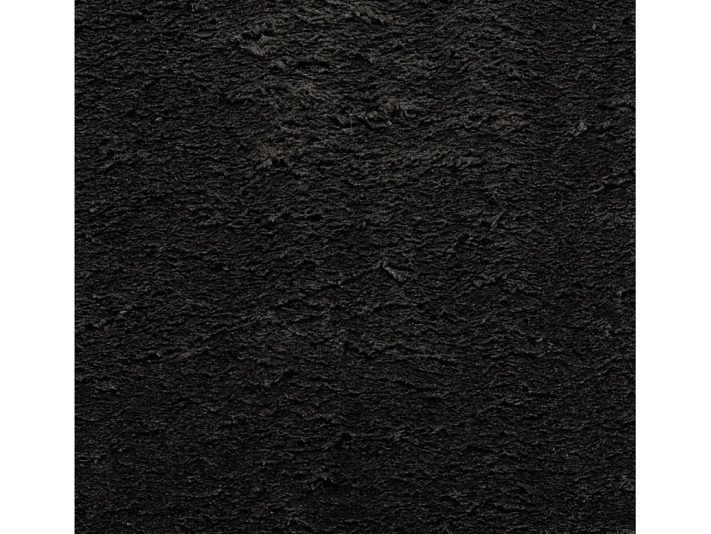 Alfombra HUARTE de pelo corto suave y lavable en color negro Ø 100 cm