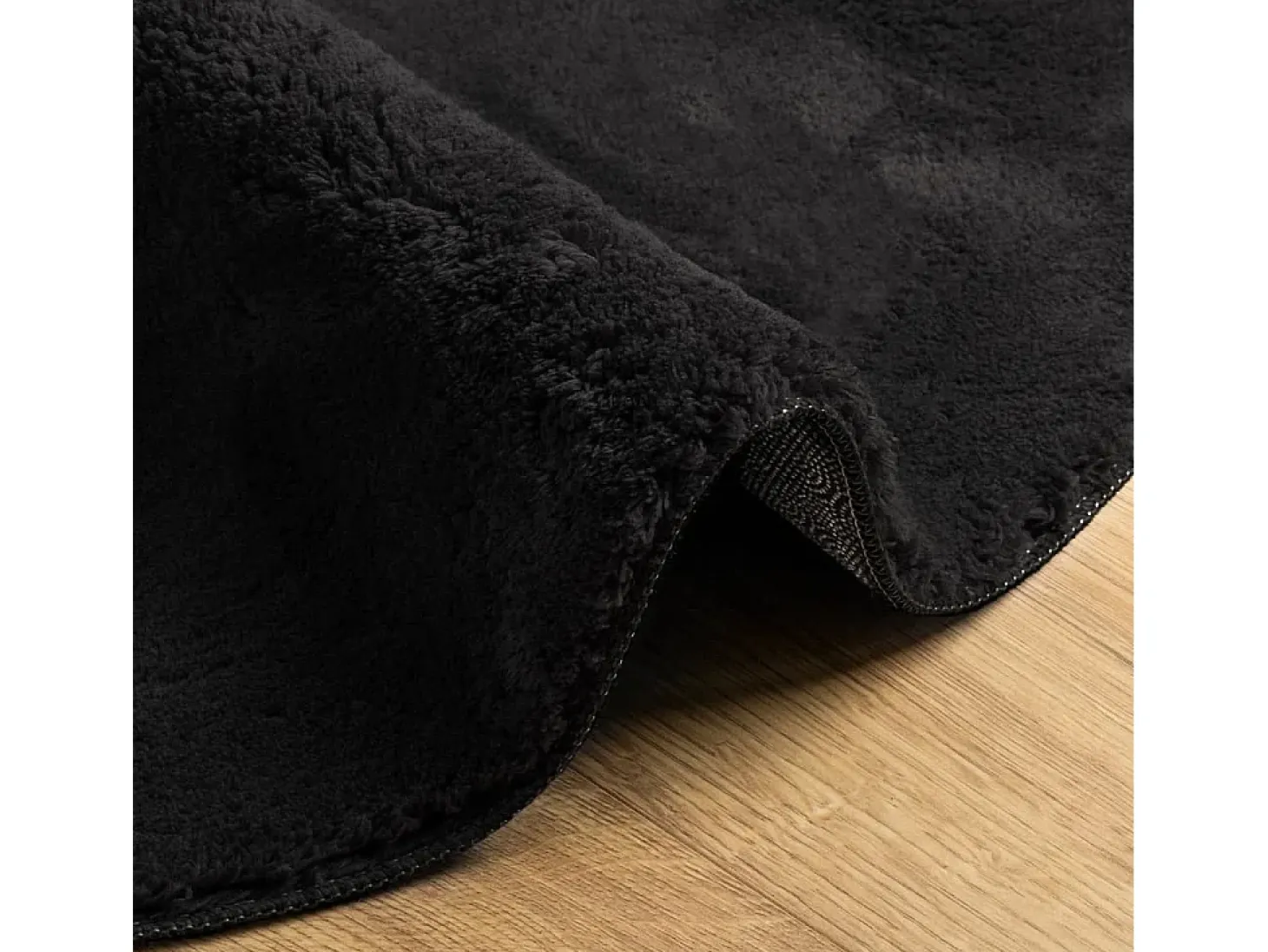 Alfombra HUARTE de pelo corto suave y lavable en color negro Ø 100 cm