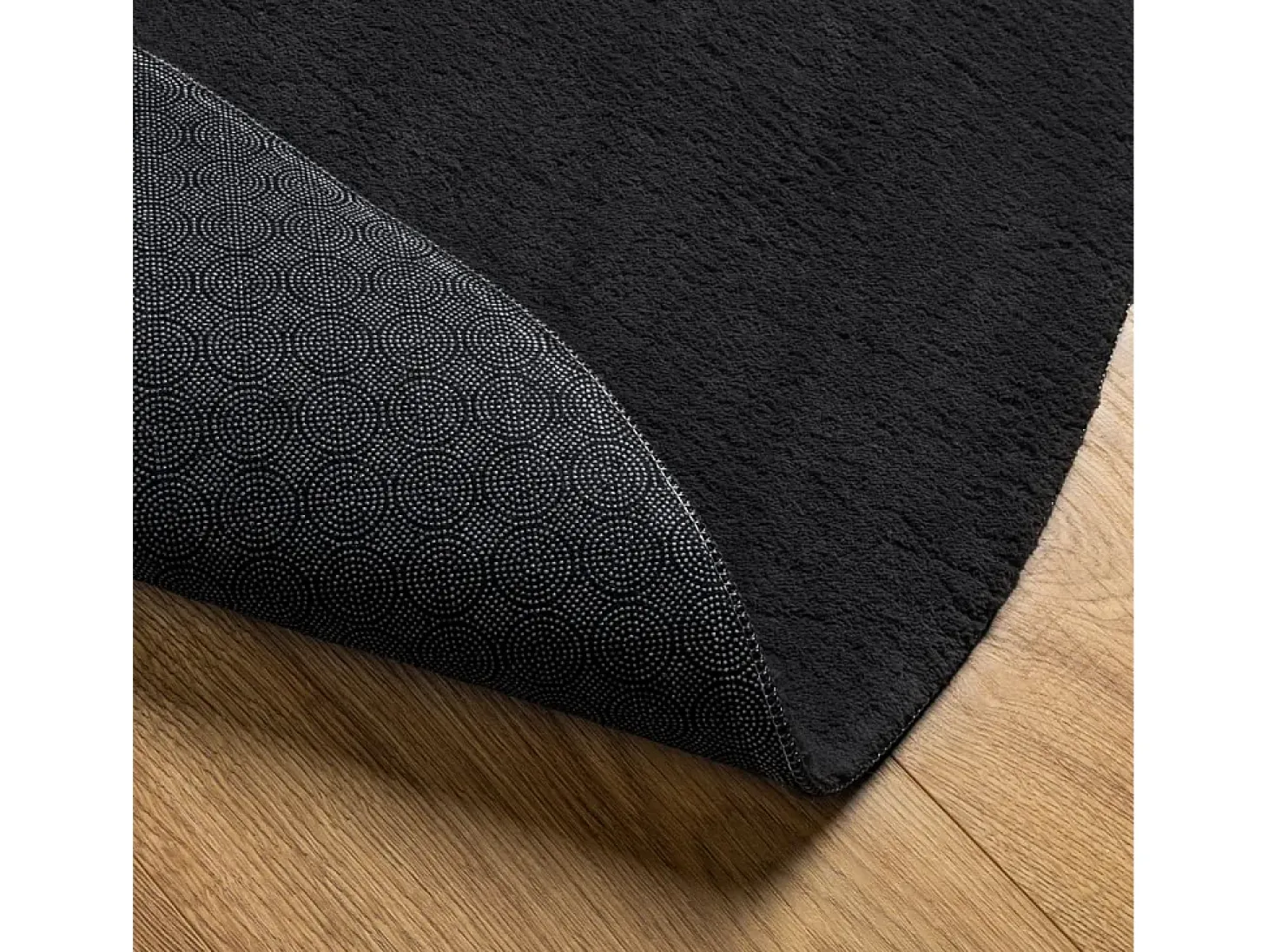 Alfombra HUARTE de pelo corto suave y lavable en color negro Ø 100 cm