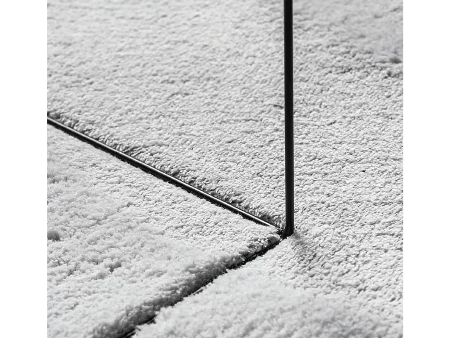 Alfombra HUARTE de pelo corto suave y lavable en gris 60x110 cm
