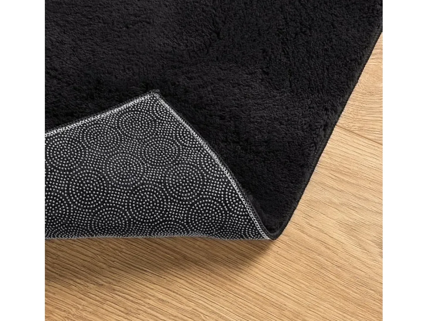 Alfombra HUARTE de pelo corto suave y lavable negra 80x200 cm