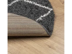 Alfombra moderna de pelo largo en color negro y crema, Ø 80 cm