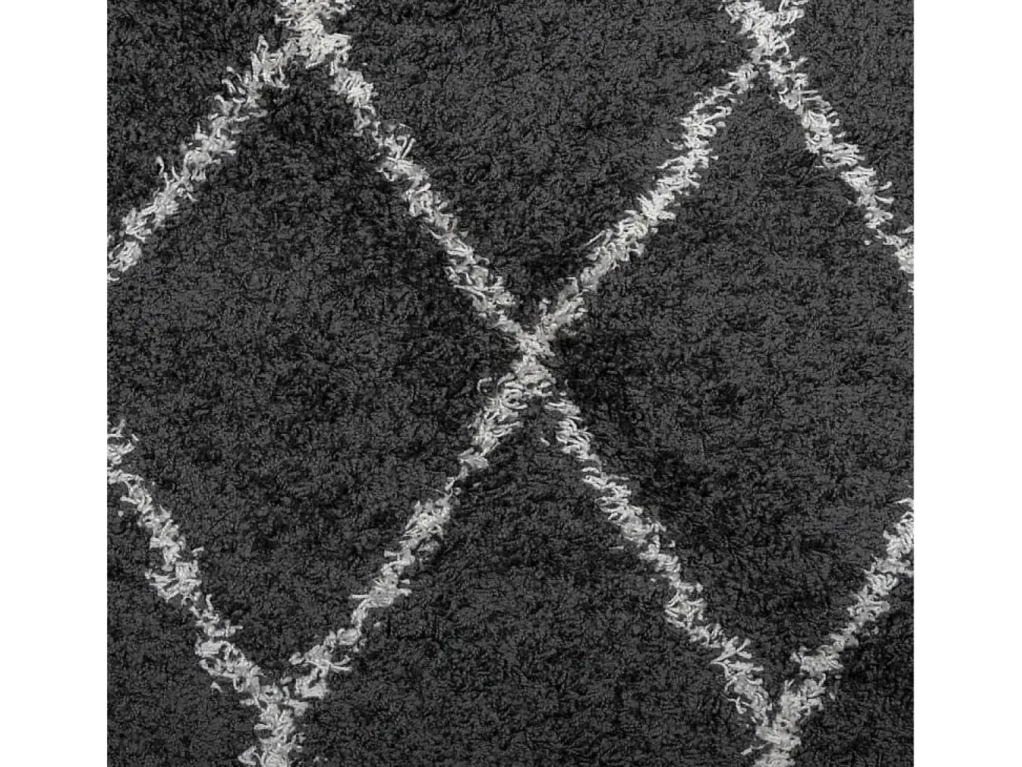 Alfombra moderna de pelo largo en color negro y crema, Ø 80 cm