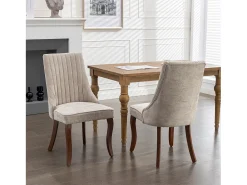 Conjunto de 2 sillas beige con patas de madera curvadas y respaldo alto.