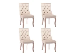 Conjunto de 4 sillas de terciopelo beige con patas de madera curvadas y botones decorativos.