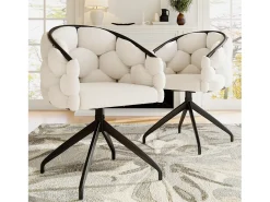 Conjunto de 2 sillas giratorias en terciopelo beige con estructura de metal negro.