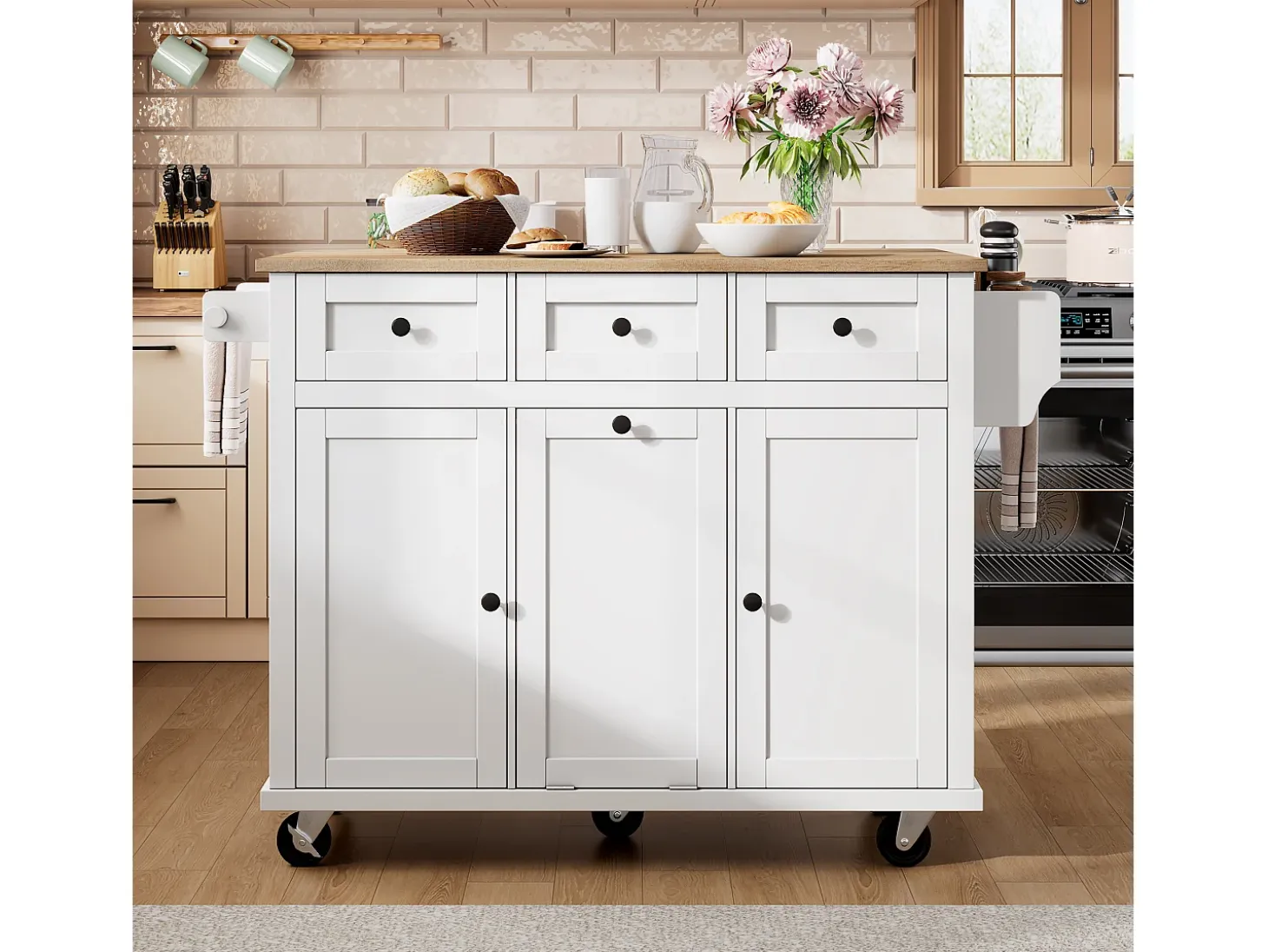 Isla de cocina móvil 131.2x46.2x92.7cm - con ruedas - 3 cajones y 3 puertas - encimera extensible - con toallero - blanco