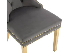 Juego de 2 sillas de cocina en terciopelo gris, estructura de metal dorado.