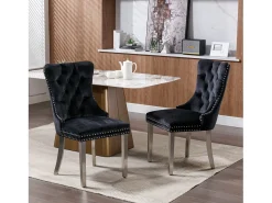 Juego de 2 sillas de comedor en terciopelo negro con respaldo acolchado y patas de metal plateado