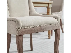 Juego de 2 sillas de comedor en chenilla beige con tachuelas decorativas y respaldo, patas de madera