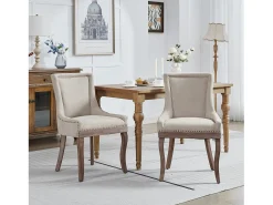 Juego de 2 sillas de comedor en chenilla beige con tachuelas decorativas y respaldo, patas de madera