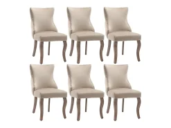 Juego de 6 sillas de comedor, tapizadas en terciopelo, con detalles de tachuelas y patas de madera maciza, color beige.