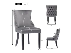 Juego de 4 sillas de terciopelo gris con patas de madera gris, botones decorativos y remaches plateados.