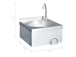 Lavabo de acero inoxidable con grifo y dispensador de jabón.