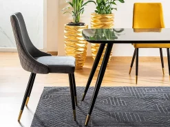 Mesa de comedor de diseño con aspecto de mármol negro y patas de metal Control