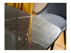 Mesa de comedor de diseño con aspecto de mármol negro y patas de metal Control