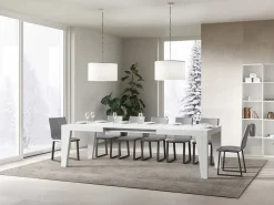 Mesa de comedor extensible de madera Naxo.-Color Blanco-Soporte 2 pies-5 alargaderas finas-Ancho extensible