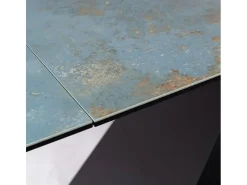 Mesa de comedor extensible de diseño Ossido Verde Holly con tapa de cerámica