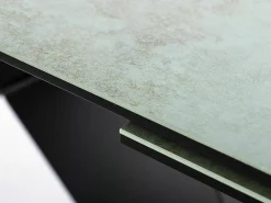 Mesa de comedor extensible de diseño Ossido Verde Holly con tapa de cerámica