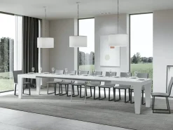 Mesa de comedor extensible de madera Kristo patas en V-Color Blanco-Base y soporte con ruedas-5 alargaderas finas-Ancho extensible
