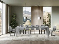 Mesa de comedor extensible de madera Kristo patas en V-Color Gris cemento-Soporte 4 pies-5 alargaderas finas-Ancho extensible