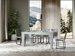 Mesa de comedor extensible de madera Kristo patas en V-Color Gris cemento-Soporte 4 pies-5 alargaderas finas-Ancho extensible