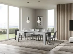 Mesa de comedor extensible de madera Naxo.-Color Gris cemento-Base y soporte con ruedas-Alargaderas -Ancho extensible