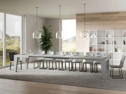 Mesa de comedor extensible de madera Naxo.-Color Gris cemento-Soporte 2 pies-5 alargaderas finas-Ancho extensible