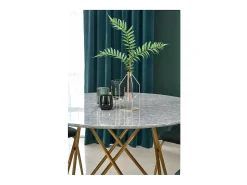 Mesa de comedor redonda con tablero de aspecto mármol y estructura de acero dorado Break