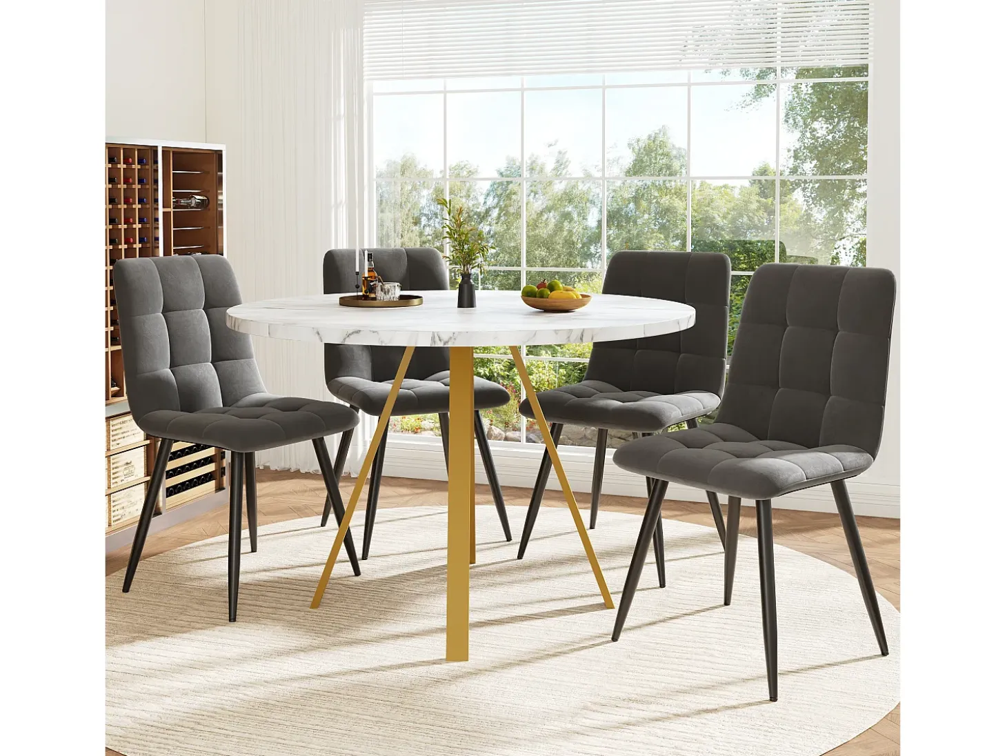 Mesa de comedor redonda de 80x80x75cm con tablero chapado efecto mármol blanco y patas de metal dorado.