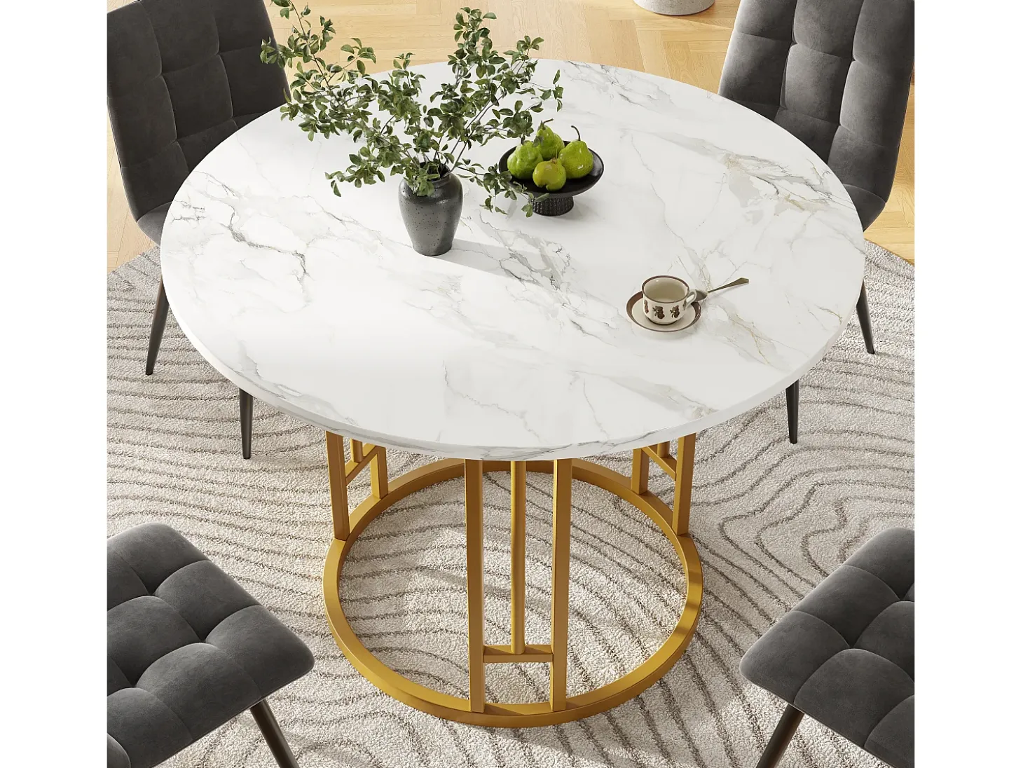 Mesa de comedor redonda de 80x80x76cm con tablero chapado efecto mármol blanco y estructura de metal dorado.