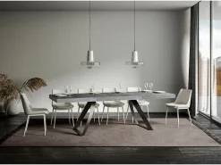 Mesa extensible con patas curvadas de acero antracita Volta-Color Gris cemento-Alargaderas -Ancho extensible