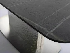 Mesa extensible de diseño con aspecto de mármol negro y pata central de acero inoxidable Eglantine