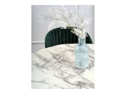 Mesa redonda con tablero de aspecto mármol blanco y pata central de diseño metálico negro DAGAN