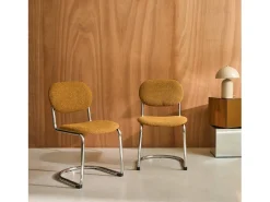 Silla cantilever redondeada de metal, borreguito texturizado y patas