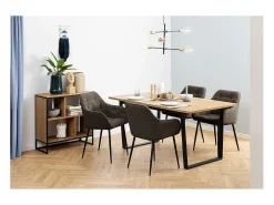 Silla de comedor Brooke con reposabrazos en bouclé gris.