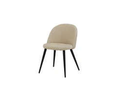 Silla de comedor de terciopelo beige.
