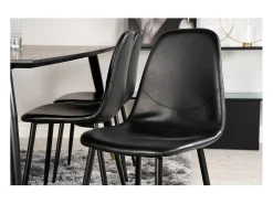Silla de comedor Polar piel sintética color negro.