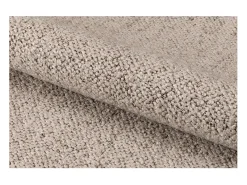 Silla de comedor Zoe con reposabrazos bouclé beige.