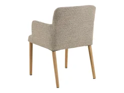 Silla de comedor Zoe con reposabrazos bouclé beige.
