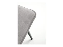 Silla de diseño Assia de tela gris con patas de metal negro