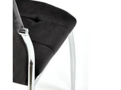 Silla Elysium tapizada en terciopelo negro con patas de metal