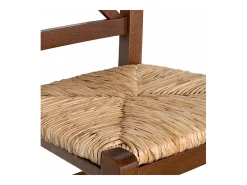 Silla rústica de madera en cruz de nogal oscuro con asiento de paja de arroz