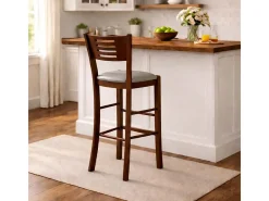 Taburete Verona en madera de nogal oscuro, altura 73 cm, con asiento acolchado color gris tórtola.